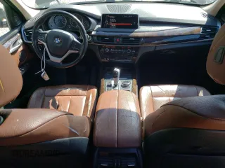 2014 BMW X5 xDrive35i z VIN 5UXKR0C57E0K47849, wystawiony jako Copart lot #42133035 z przebiegiem 134 957 mil mil oraz Szkoda całkowita • Salvage title. Historia ofert i sprzedaży dostępna na DreamBid. Obrazek 8.