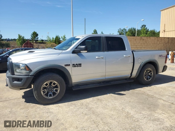 2017 Ram 1500 Rebel z VIN 1C6RR7YT4HS531035, wystawiony jako Copart lot #57652345 z przebiegiem 130 013 mil mil oraz Czysty tytuł • Clean title. Historia ofert i sprzedaży dostępna na DreamBid. Obrazek 1.