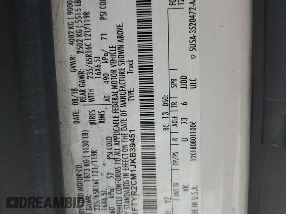 2018 Ford Transit z VIN 1FTYR2CM1JKB39451, wystawiony jako Copart lot #70852124 z przebiegiem 230 942 mil mil oraz Tytuł czysty. Historia ofert i sprzedaży dostępna na DreamBid. Obrazek 12.