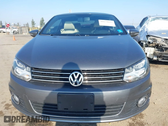 2015 Volkswagen Eos Komfort with VIN WVWBW8AH7FV004228, listed as a IAAI auction lot 41659825 with 71,468 mi miles and . Bid and sale history available at DreamBid. Image 12.
