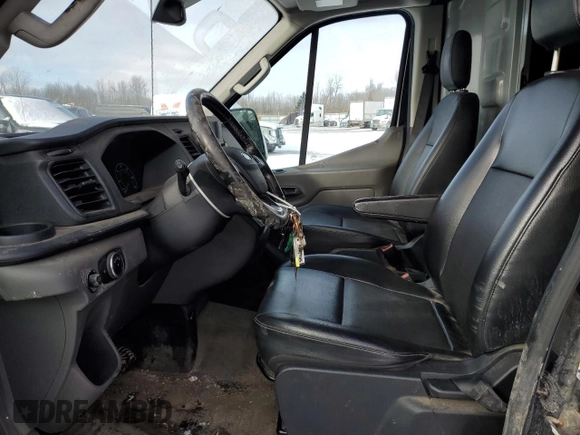 2020 Ford Transit Cargo with VIN 1FTBR2X81LKB73704, listed as a Copart auction lot 87871045 with 184,672 mi miles and Clean Title. Bid and sale history available at DreamBid. Image 7.