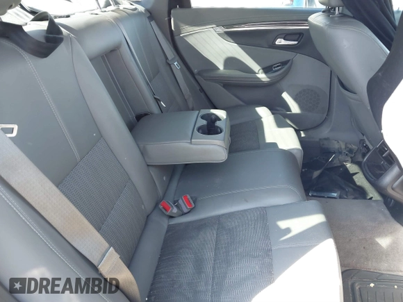 2014 Chevrolet Impala LT with VIN 2G1125S36E9100886, listed as a IAAI auction lot 41764733 with 82,000 mi miles and . Bid and sale history available at DreamBid. Image 8.