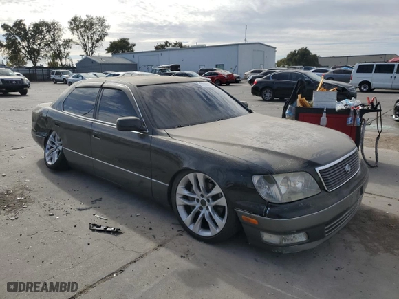 1999 Lexus LS 400 Luxury Sdn with VIN JT8BH28F7X0141873, listed as a Copart auction lot 77898024 with 235,914 mi miles and Salvage Title. Bid and sale history available at carsss.com. Image 4.