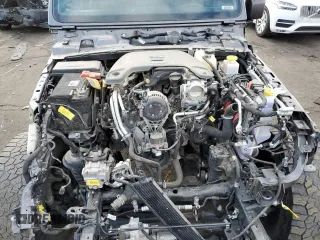 2021 Jeep Gladiator Rubicon with VIN 1C6JJTBG4ML504141, listed as a Copart auction lot 43367565 with 56,879 mi miles and Salvage title. Bid and sale history available at DreamBid. Image 13.