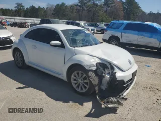 2017 Volkswagen Beetle 1.8T SE with VIN 3VWJ17AT0HM607718, listed as a Copart auction lot 48564925 with 72,339 mi miles and Salvage Title. Bid and sale history available at carsss.com. Image 4.