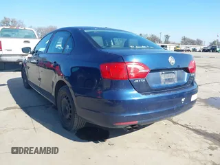 2012 Volkswagen Jetta Sedan SE w/Convenience PZEV with VIN 3VWDP7AJ5CM340319, listed as a IAAI auction lot 41636040 with 164,409 mi miles. Bid and sale history available at carsss.com. Image 3.