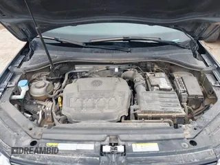 2021 Volkswagen Tiguan S with VIN 3VV0B7AX0MM017433, listed as a IAAI auction lot 42017125 with 54,624 mi miles and . Bid and sale history available at DreamBid. Image 10.