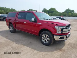 2019 Ford F-150 XL with VIN 1FTEW1E44KFB16372, listed as a IAAI auction lot 42491356 with 144,559 mi miles and . Bid and sale history available at DreamBid. Image 1.