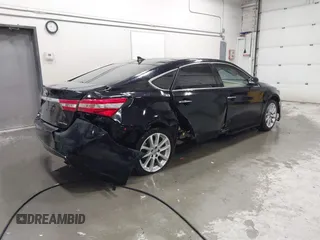 2015 Toyota Avalon Limited with VIN 4T1BK1EB6FU176700, listed as a IAAI auction lot 41182880 with 104,830 mi miles and . Bid and sale history available at DreamBid. Image 4.