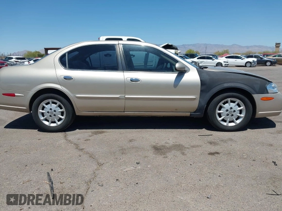 2000 Nissan Maxima GXE z VIN JN1CA31D0YT739248, wystawiony jako IAAI lot #42089086 z przebiegiem 140 979 mil mil oraz . Historia ofert i sprzedaży dostępna na DreamBid. Obrazek 13.