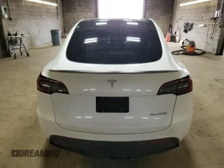 2023 Tesla Model Y Performance z VIN 7SAYGDEF6PF798103, wystawiony jako Copart lot #53607895 z przebiegiem 22 334 mil mil oraz Szkoda całkowita • Salvage title. Historia ofert i sprzedaży dostępna na DreamBid. Obrazek 6.