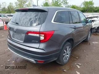 2019 Honda Pilot EX-L with VIN 5FNYF6H57KB053786, listed as a IAAI auction lot 42161832 with 89,326 mi miles and . Bid and sale history available at carsss.com. Image 4.