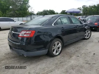 2015 Ford Taurus SE with VIN 1FAHP2D88FG136022, listed as a Copart auction lot 50944035 with 221,164 mi miles and Salvage Title. Bid and sale history available at DreamBid. Image 3.