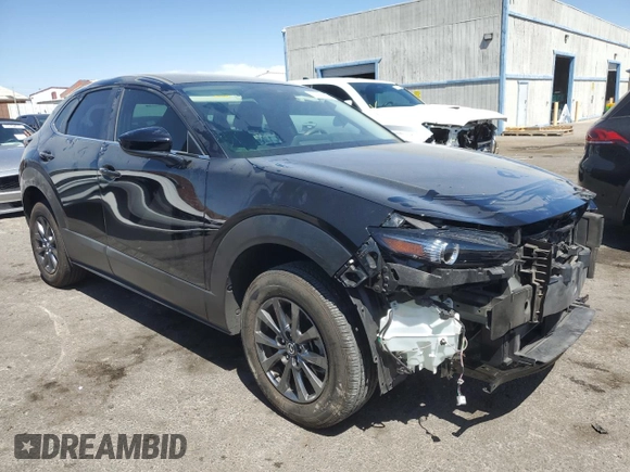 2021 Mazda CX-30 S with VIN 3MVDMBAL0MM302383, listed as a Copart auction lot 52392955 with 23,890 mi miles and Salvage Title. Bid and sale history available at carsss.com. Image 4.