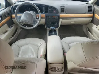 2001 Lincoln Continental with VIN 1LNHM97V71Y711352, listed as a Copart auction lot 46235305 with 122,786 mi miles and Salvage Title. Bid and sale history available at DreamBid. Image 8.