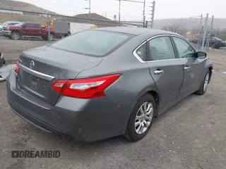 2016 Nissan Altima S with VIN 1N4AL3AP2GN359698, listed as a IAAI auction lot 41520202 with 190,040 mi miles and . Bid and sale history available at carsss.com. Image 4.