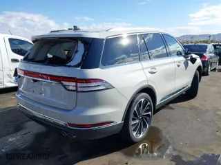 2023 Lincoln Aviator Reserve with VIN 5LM5J7WC0PGL14870, listed as a IAAI auction lot 41278696 with 1 mi miles. Bid and sale history available at carsss.com. Image 4.