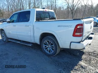 2022 Ram 1500 Laramie with VIN 1C6SRFJTXNN237199, listed as a IAAI auction lot 41705536 with 35,143 mi miles and . Bid and sale history available at DreamBid. Image 3.