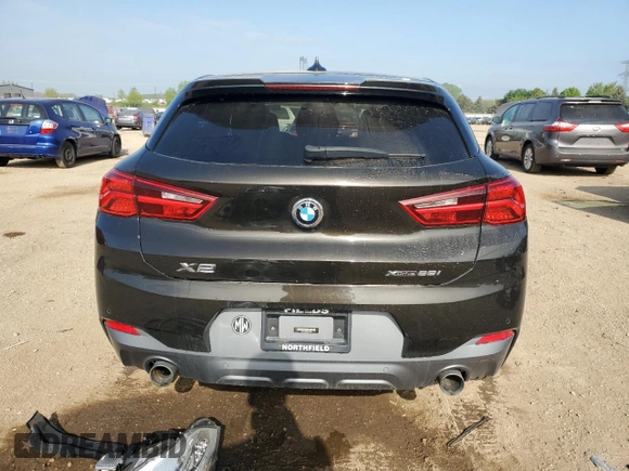 2018 BMW X2 xDrive28i z VIN WBXYJ5C38JEB19248, wystawiony jako Copart lot #56307905 z przebiegiem 40 084 mil mil oraz Szkoda całkowita • Salvage title. Historia ofert i sprzedaży dostępna na DreamBid. Obrazek 6.