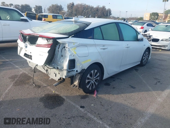 2021 Toyota Prius LE with VIN JTDKAMFP7M3193401, listed as a IAAI auction lot 41540021 with 45,822 mi miles and . Bid and sale history available at DreamBid. Image 4.
