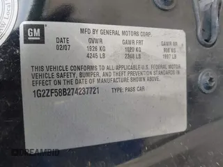 2007 Pontiac G6 1SV Value Leader z VIN 1G2ZF58B274237721, wystawiony jako IAAI lot #42410746 z przebiegiem Nie podano mil oraz . Historia ofert i sprzedaży dostępna na DreamBid. Obrazek 9.