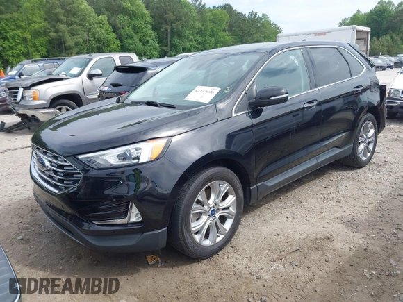 2021 Ford Edge Titanium z VIN 2FMPK3K99MBA16882, wystawiony jako IAAI lot #42214606 z przebiegiem 140 031 mil mil oraz . Historia ofert i sprzedaży dostępna na DreamBid. Obrazek 20.