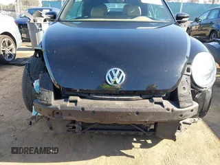 2013 Volkswagen Beetle 50s Edition with VIN 3VW5P7AT5DM829195, listed as a IAAI auction lot 42225948 with 87,202 mi miles and . Bid and sale history available at DreamBid. Image 6.