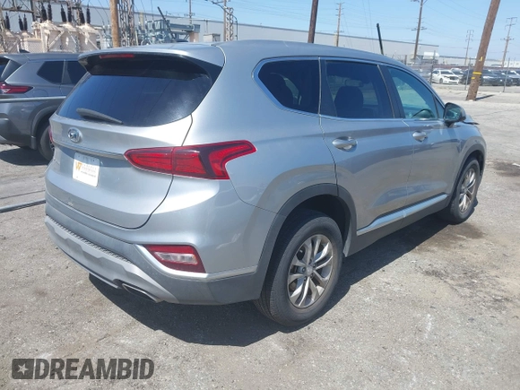 2020 Hyundai Santa Fe SE with VIN 5NMS23AD2LH220153, listed as a IAAI auction lot 42344499 with 28,346 mi miles and . Bid and sale history available at DreamBid. Image 4.
