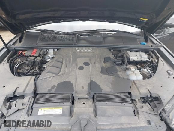 2019 Audi Q7 Premium with VIN WA1AAAF74KD002299, listed as a IAAI auction lot 42066717 with 91,898 mi miles and . Bid and sale history available at DreamBid. Image 10.