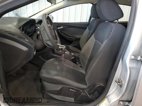 2013 Ford Focus SE z VIN 1FADP3F26DL314690, wystawiony jako Copart lot #58408575 z przebiegiem Nie podano mil oraz Szkoda całkowita • Salvage title. Historia ofert i sprzedaży dostępna na DreamBid. Obrazek 7.