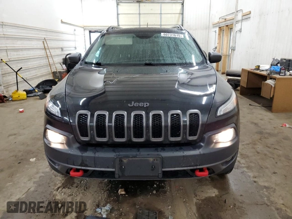 2015 Jeep Cherokee Trailhawk z VIN 1C4PJMBS0FW598694, wystawiony jako Copart lot #60731615 z przebiegiem 130 219 mil mil oraz Czysty tytuł • Clean title. Historia ofert i sprzedaży dostępna na DreamBid. Obrazek 5.