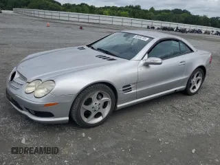 2005 Mercedes-Benz SL 500 with VIN WDBSK75F95F104935, listed as a Copart auction lot 60493705 with 89,994 mi miles and Salvage title. Bid and sale history available at DreamBid. Image 1.