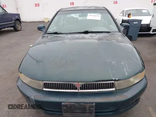 2001 Mitsubishi Galant ES z VIN 4A3AA46G81E210487, wystawiony jako IAAI lot #42120831 z przebiegiem Nie podano mil oraz . Historia ofert i sprzedaży dostępna na DreamBid. Obrazek 6.