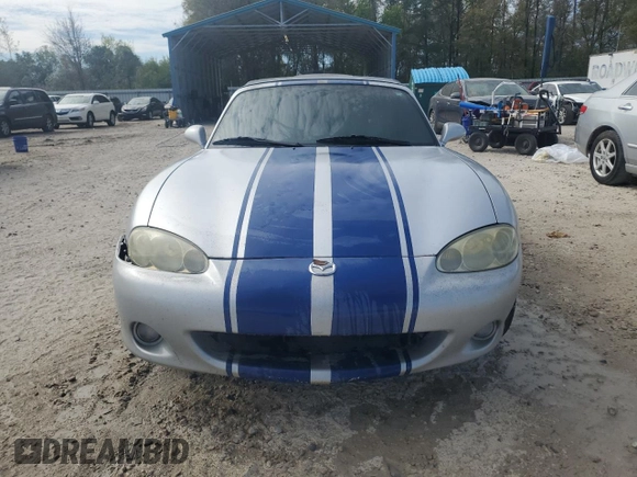 2003 Mazda MX-5 Miata Cloth with VIN JM1NB353430304103, listed as a Copart auction lot 50574245 with Not provided miles and Salvage title. Bid and sale history available at DreamBid. Image 5.