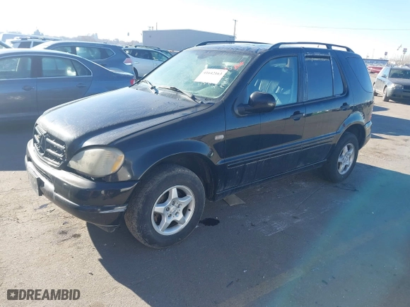 2001 Mercedes-Benz M-Class with VIN 4JGAB54E31A269408, listed as a IAAI auction lot 41642163 with 1 mi miles. Bid and sale history available at carsss.com. Image 2.