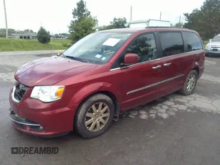 2016 Chrysler Town & Country Touring with VIN 2C4RC1BG6GR150001, listed as a IAAI auction lot 40123738 with 149,006 mi miles. Bid and sale history available at carsss.com. Image 2.