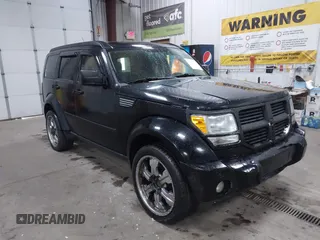 2007 Dodge Nitro SLT z VIN 1D8GU58K57W731893, wystawiony jako IAAI lot #42174522 z przebiegiem 187 079 mil mil oraz . Historia ofert i sprzedaży dostępna na DreamBid. Obrazek 1.