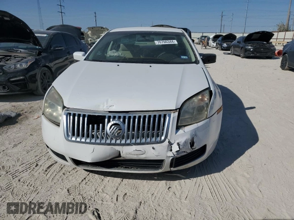 2006 Mercury Milan с VIN 3MEFM07146R600606, выставлен на аукционе Copart как лот 76766344 с пробегом 75 408 миль миль и Списание • Salvage title. История ставок и продаж доступна на DreamBid. Изображение 5.