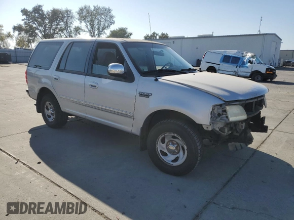 1997 Ford Expedition XLT z VIN 1FMEU1768VLA49281, wystawiony jako Copart lot #79895244 z przebiegiem 73 188 mil mil oraz Szkoda całkowita • Salvage title. Historia ofert i sprzedaży dostępna na DreamBid. Obrazek 4.