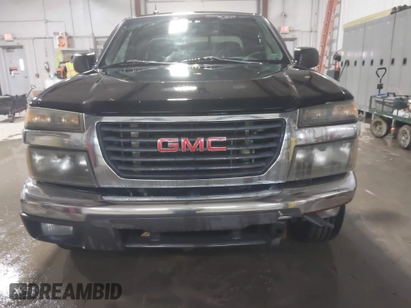 2008 GMC Canyon SL with VIN 1GTCS19EX88122292, listed as a IAAI auction lot 41599345 with 208,318 mi miles. Bid and sale history available at carsss.com. Image 6.