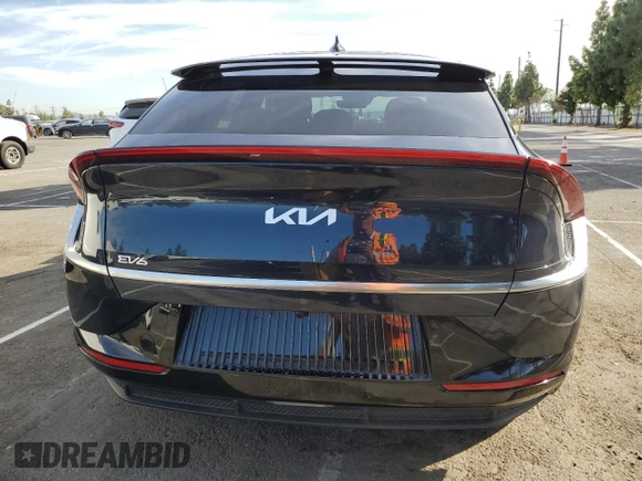2023 Kia EV6 Wind with VIN KNDC34LA9P5602084, listed as a Copart auction lot 77227004 with 40,630 mi miles and Salvage Title. Bid and sale history available at carsss.com. Image 6.