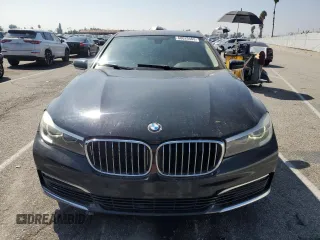 2016 BMW 7 Series 740i with VIN WBA7E2C59GG547804, listed as a Copart auction lot 68620463 with 122,937 mi miles. Bid and sale history available at carsss.com. Image 5.