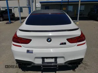 2015 BMW M6 z VIN WBS6C9C50FD467538, wystawiony jako Copart lot #52152245 z przebiegiem 65 483 mil mil oraz Czysty tytuł • Clean title. Historia ofert i sprzedaży dostępna na DreamBid. Obrazek 6.
