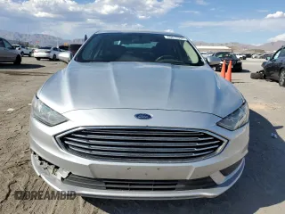 2018 Ford Fusion SE z VIN 3FA6P0LU7JR139974, wystawiony jako Copart lot #69819394 z przebiegiem 164 123 mil mil oraz Szkoda całkowita • Salvage title. Historia ofert i sprzedaży dostępna na DreamBid. Obrazek 5.