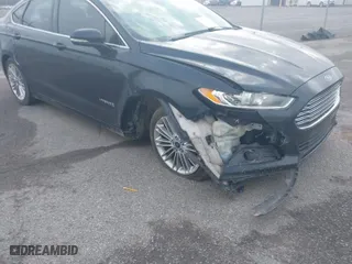 2014 Ford Fusion SE Hybrid with VIN 3FA6P0LU7ER282848, listed as a IAAI auction lot 41560449 with 180,696 mi miles. Bid and sale history available at carsss.com. Image 6.