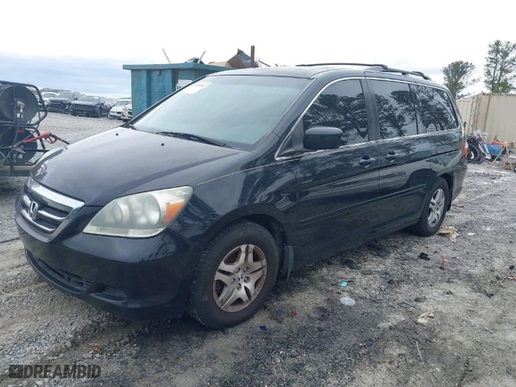 2005 Honda Odyssey EX-L with VIN 5FNRL38745B130034, listed as a IAAI auction lot 41800841 with 266,620 mi miles. Bid and sale history available at carsss.com. Image 2.