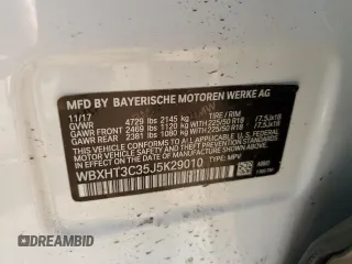2018 BMW X1 xDrive28i z VIN WBXHT3C35J5K29010, wystawiony jako Copart lot #47537165 z przebiegiem 90 779 mil mil oraz Szkoda całkowita • Salvage title. Historia ofert i sprzedaży dostępna na DreamBid. Obrazek 12.