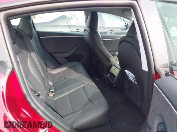 2025 Tesla Model 3 Long Range with VIN 5YJ3E1EB7SF890659, listed as a IAAI auction lot 41550353 with 1,004 mi miles and . Bid and sale history available at DreamBid. Image 8.