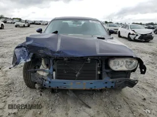2013 Dodge Challenger SXT z VIN 2C3CDYAG8DH609306, wystawiony jako Copart lot #55772985 z przebiegiem 179 231 mil mil oraz Szkody całkowita. Historia ofert i sprzedaży dostępna na DreamBid. Obrazek 5.