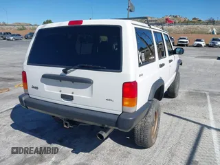 1997 Jeep Cherokee SE with VIN 1J4FJ28S7VL553270, listed as a IAAI auction lot 41825524 with 157,015 mi miles. Bid and sale history available at carsss.com. Image 4.
